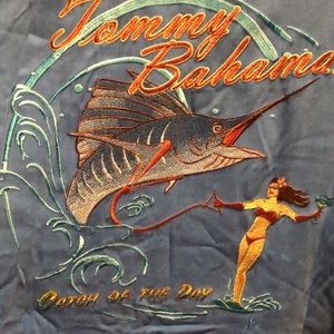 A slightly used embroidered Tommy Bahama button down shirt.